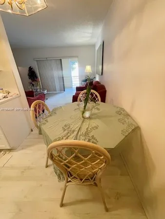 a bed sitting in a room next to a window