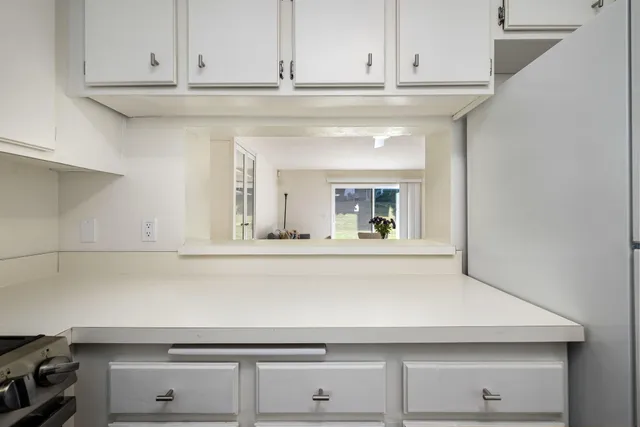 a bathroom with a sink toilet and mirror