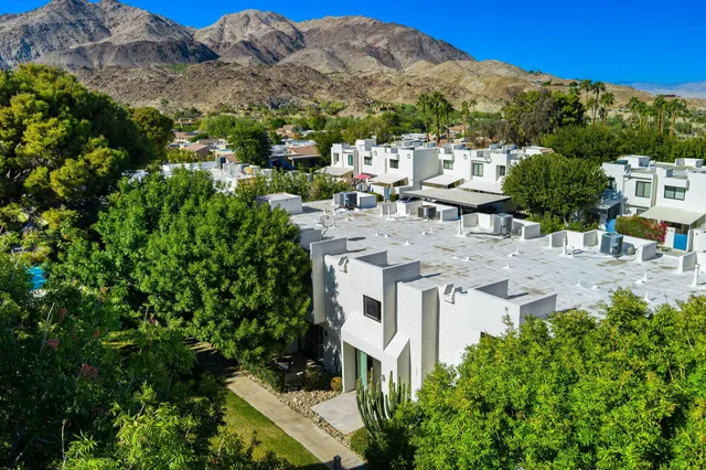 a view of a houses with a yard