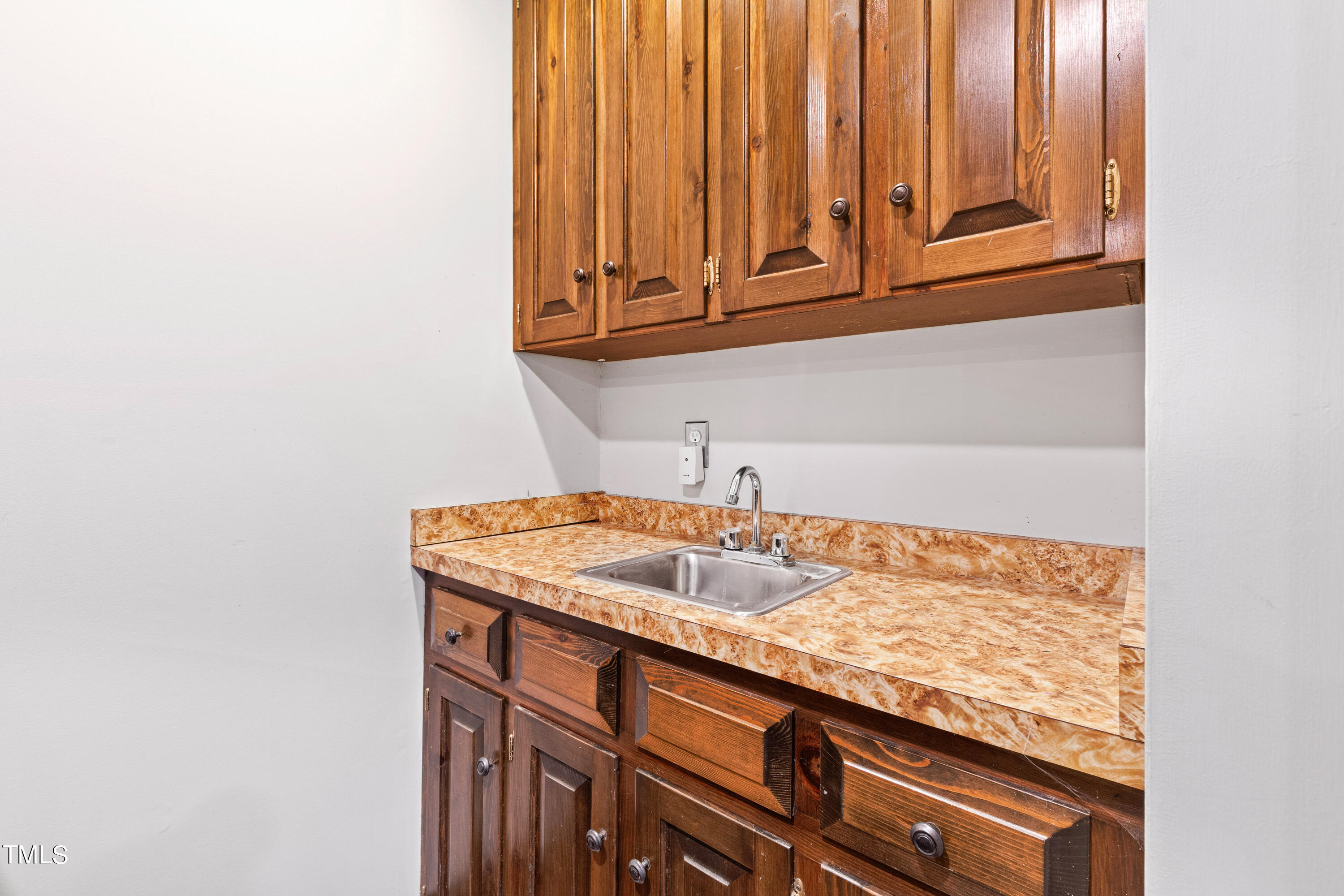 3405 Stallion Court Raleigh, NC 27613 - Photo 20 of 55 a bathroom with a sink and a window