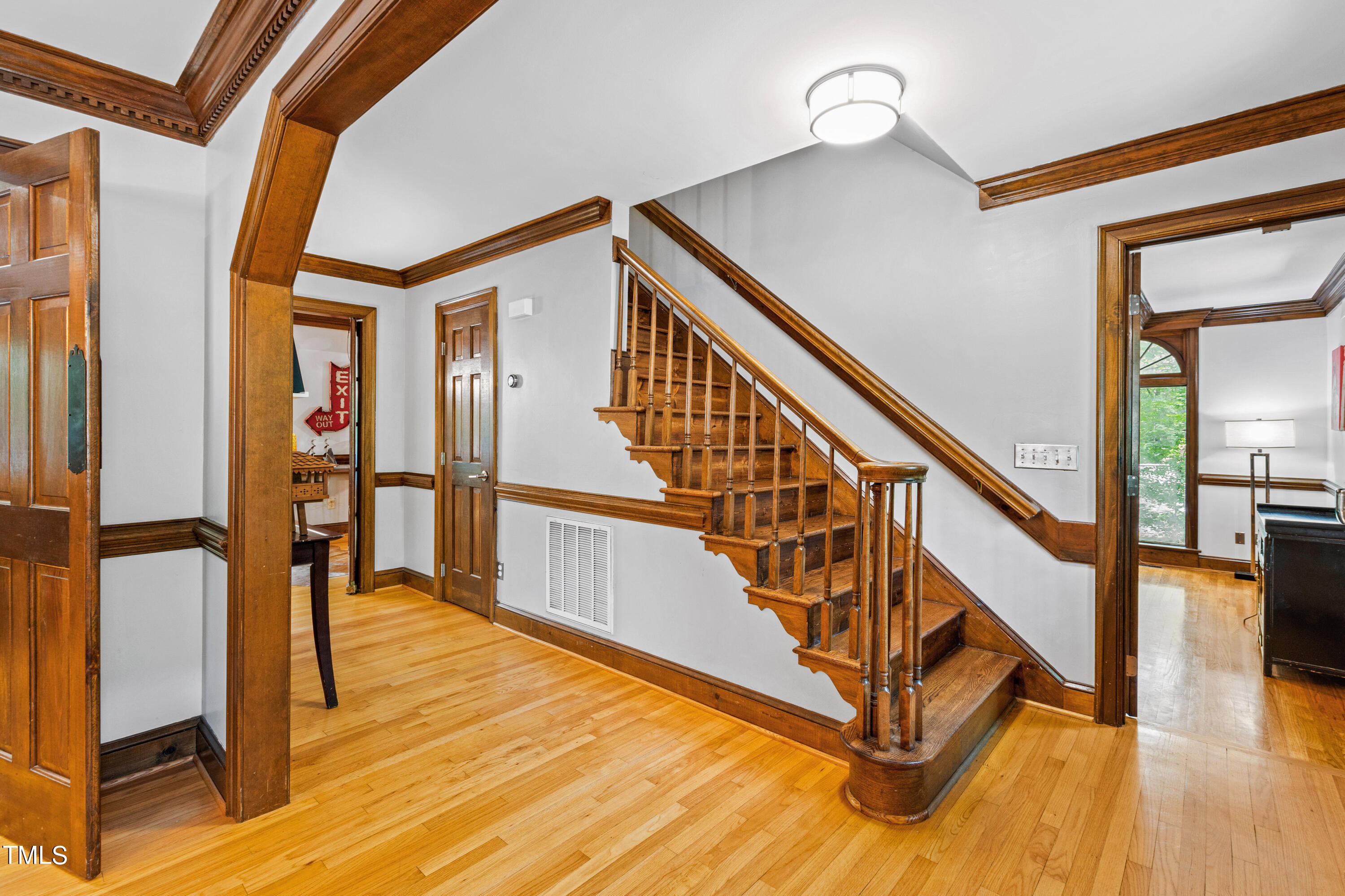 3405 Stallion Court Raleigh, NC 27613 - Photo 23 of 55 a view of entryway and hall with wooden floor