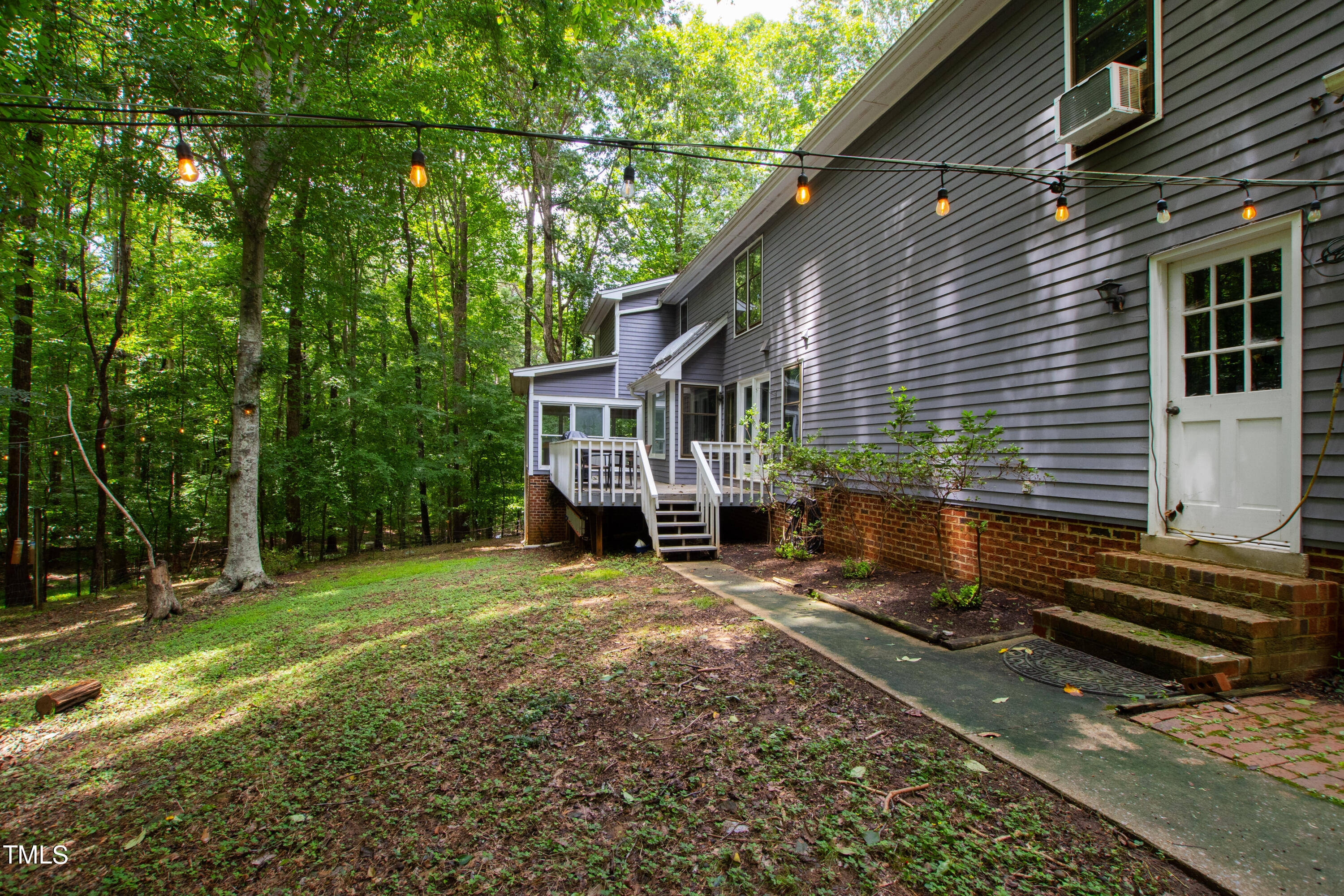 3405 Stallion Court Raleigh, NC 27613 - Photo 47 of 55 a view of a house with backyard and sitting area