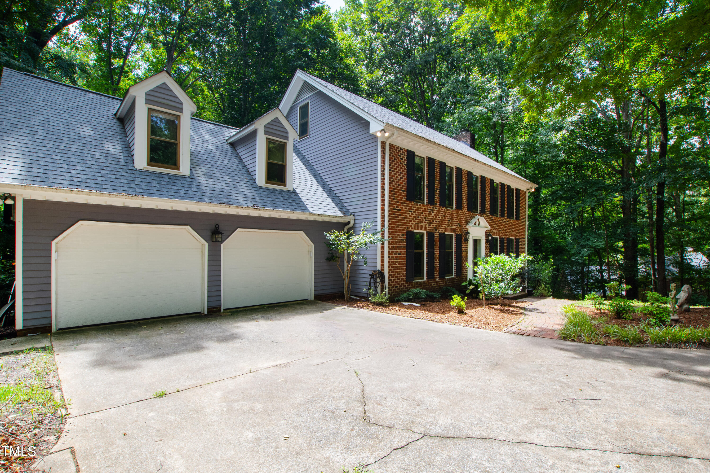3405 Stallion Court Raleigh, NC 27613 - Photo 48 of 55 a front view of a house with a yard