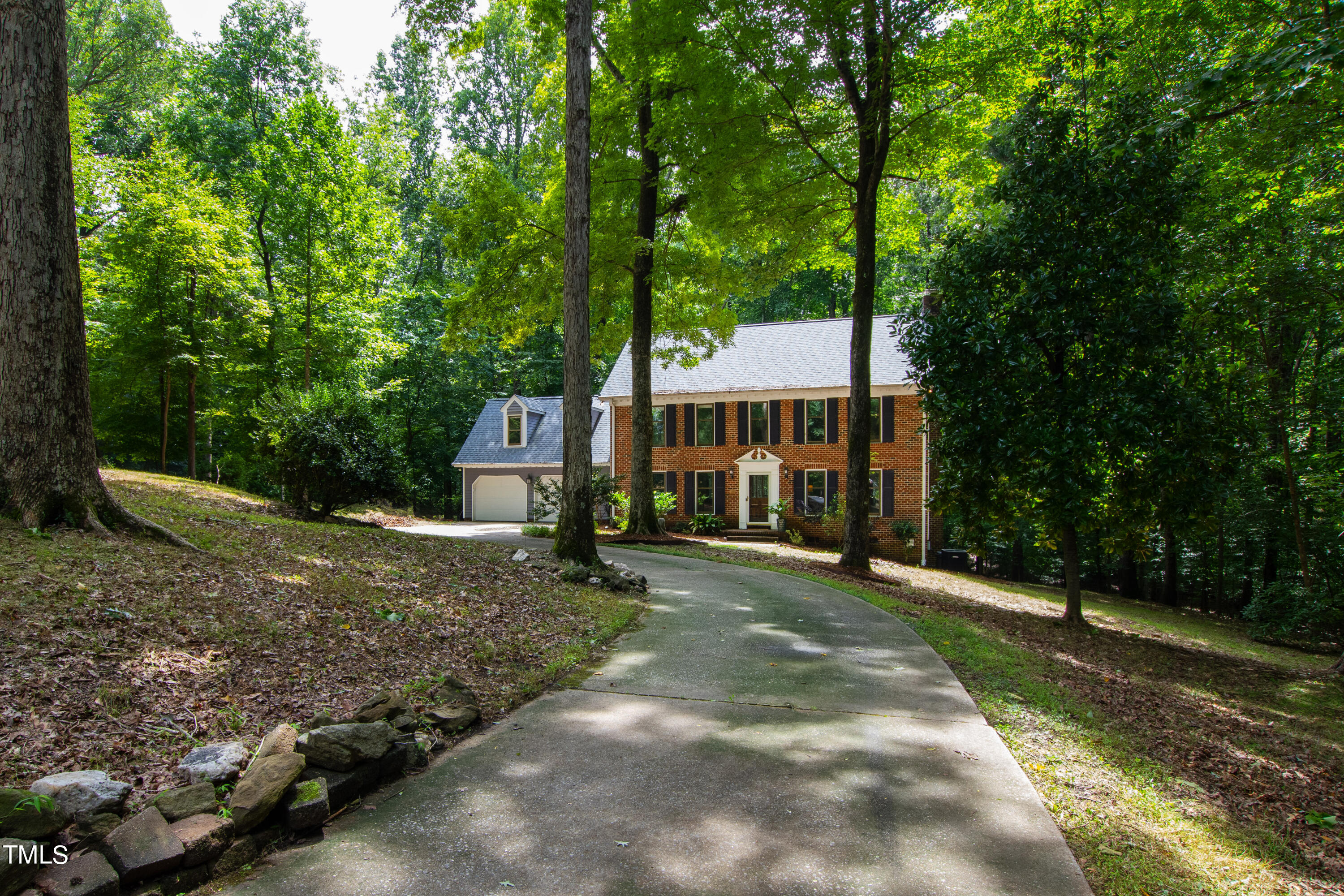3405 Stallion Court Raleigh, NC 27613 - Photo 49 of 55 a view of a house with backyard and sitting area