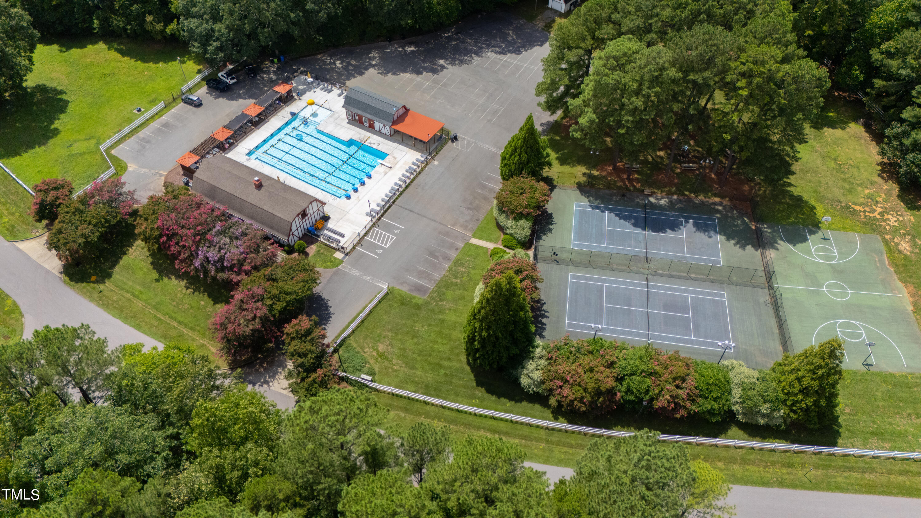 3405 Stallion Court Raleigh, NC 27613 - Photo 53 of 55 an aerial view of a house with a garden and swimming pool