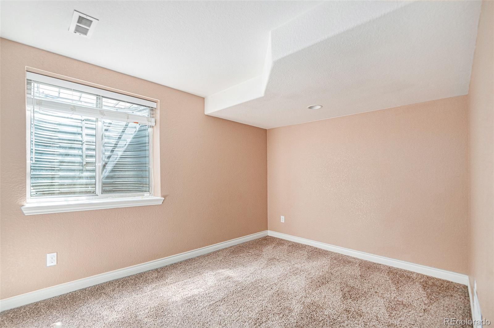 5253 Wangaratta Way Highlands Ranch, CO 80130 - Photo 25 of 43 a view of an empty room with a window