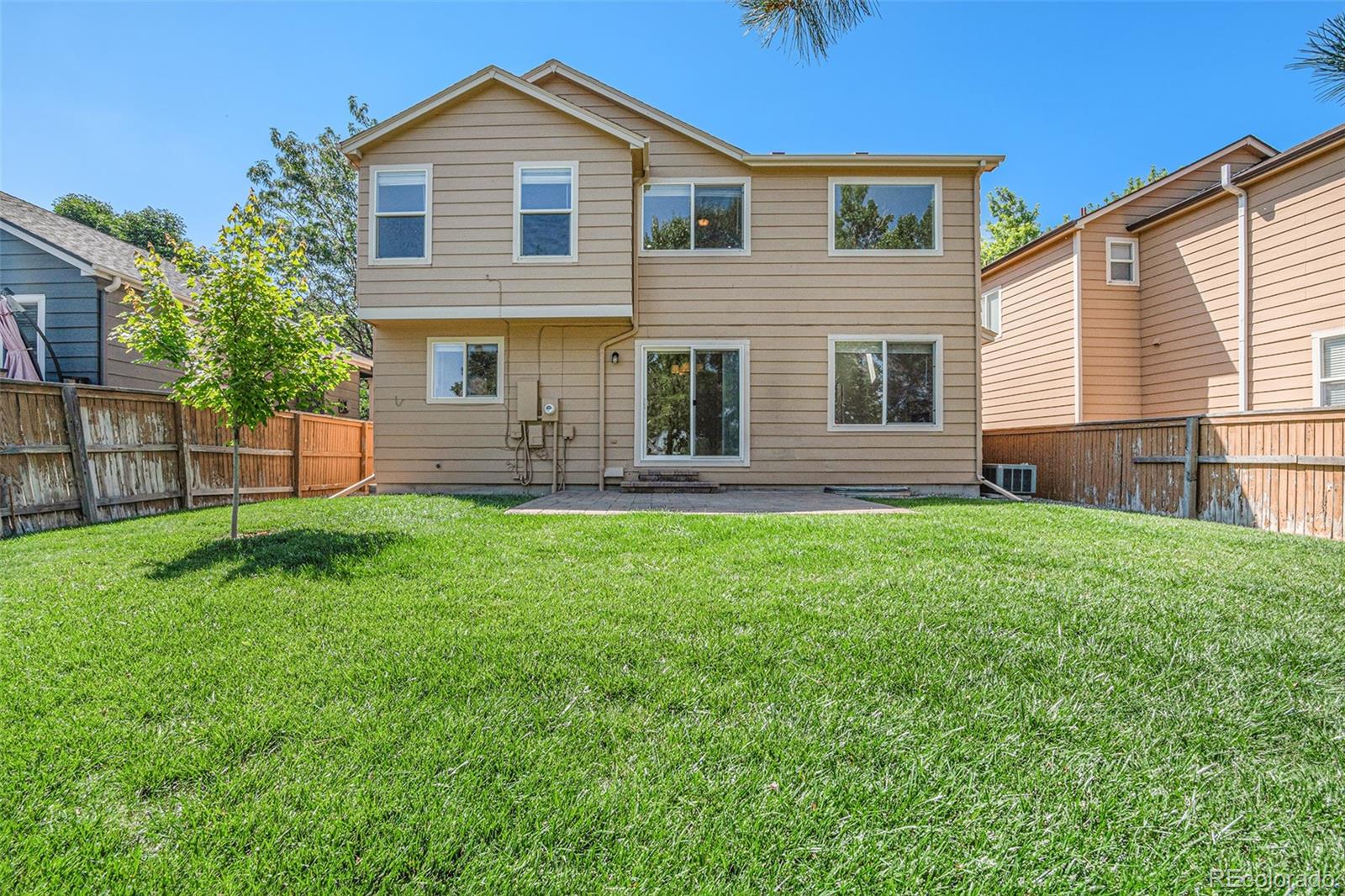 5253 Wangaratta Way Highlands Ranch, CO 80130 - Photo 27 of 43 a front view of a house with a yard