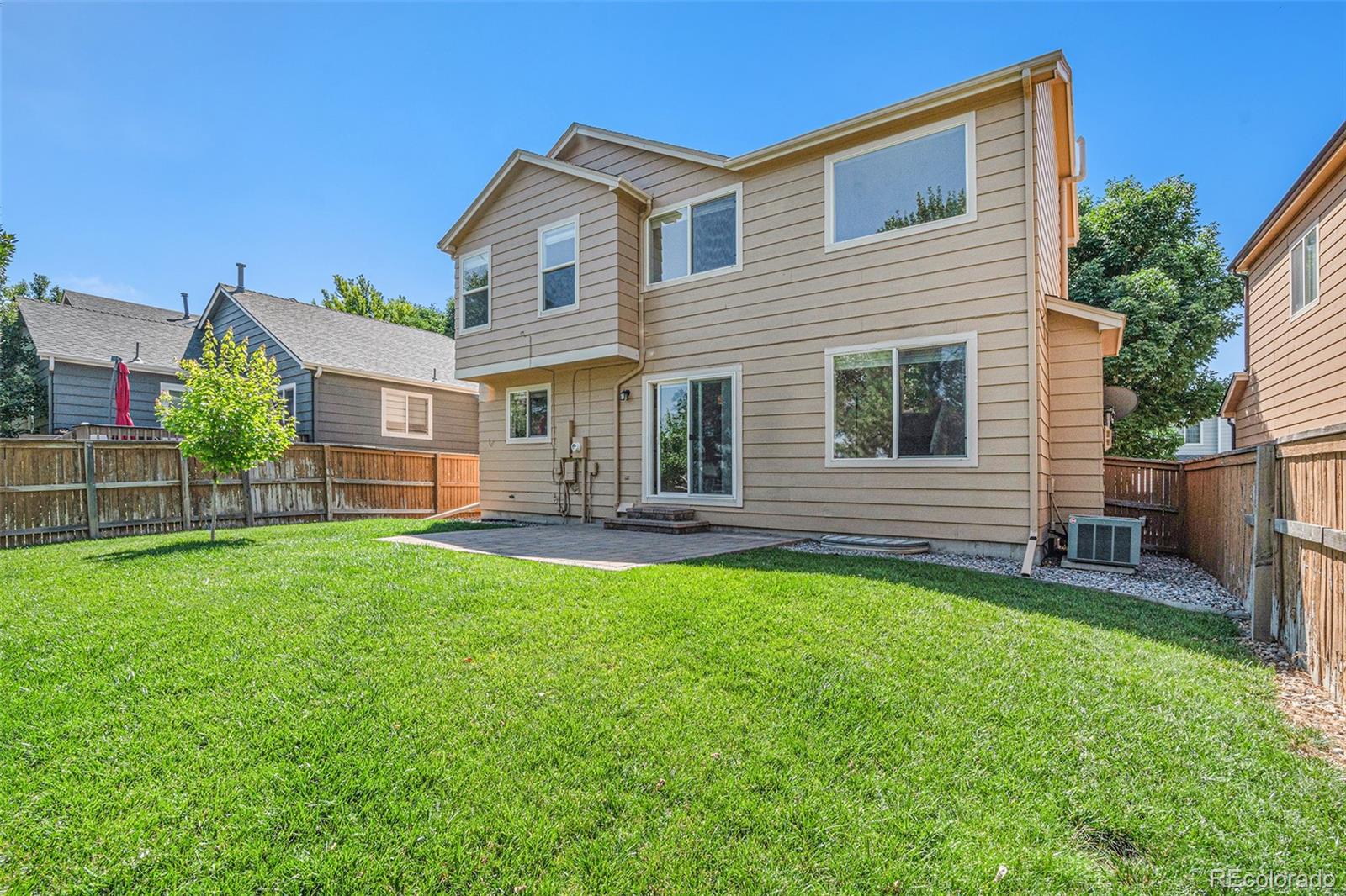 5253 Wangaratta Way Highlands Ranch, CO 80130 - Photo 3 of 43 a view of a house with a backyard