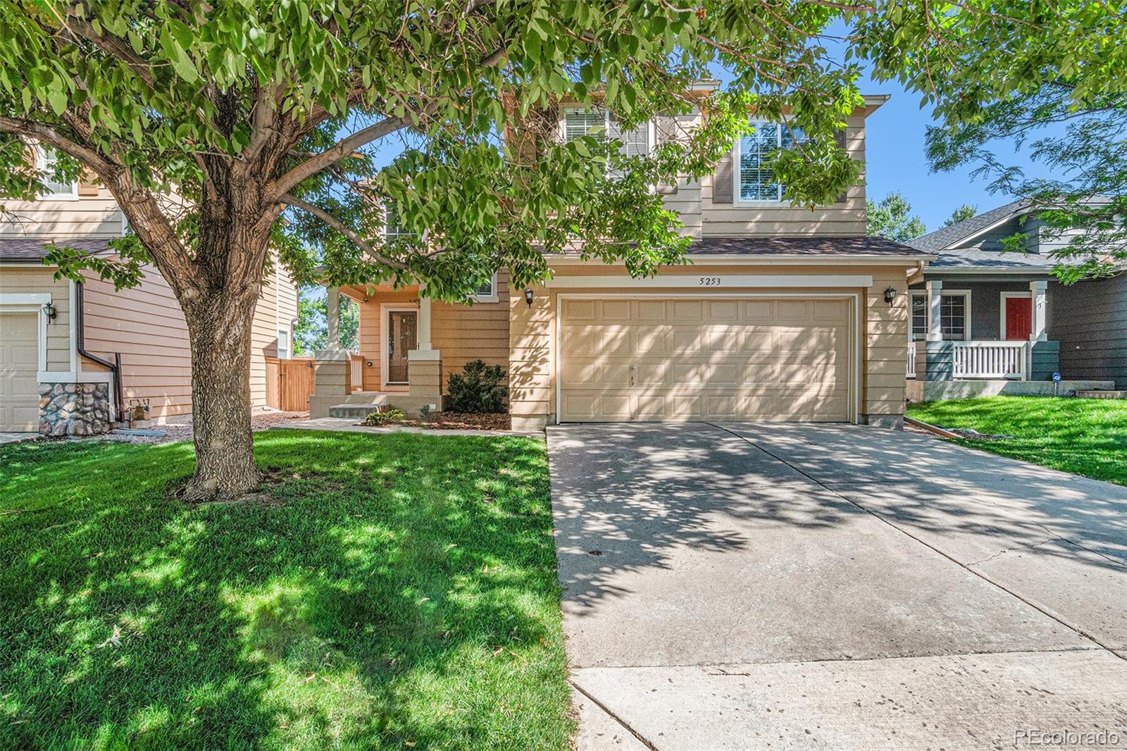 5253 Wangaratta Way Highlands Ranch, CO 80130 - Photo 32 of 43 front view of a house with a yard