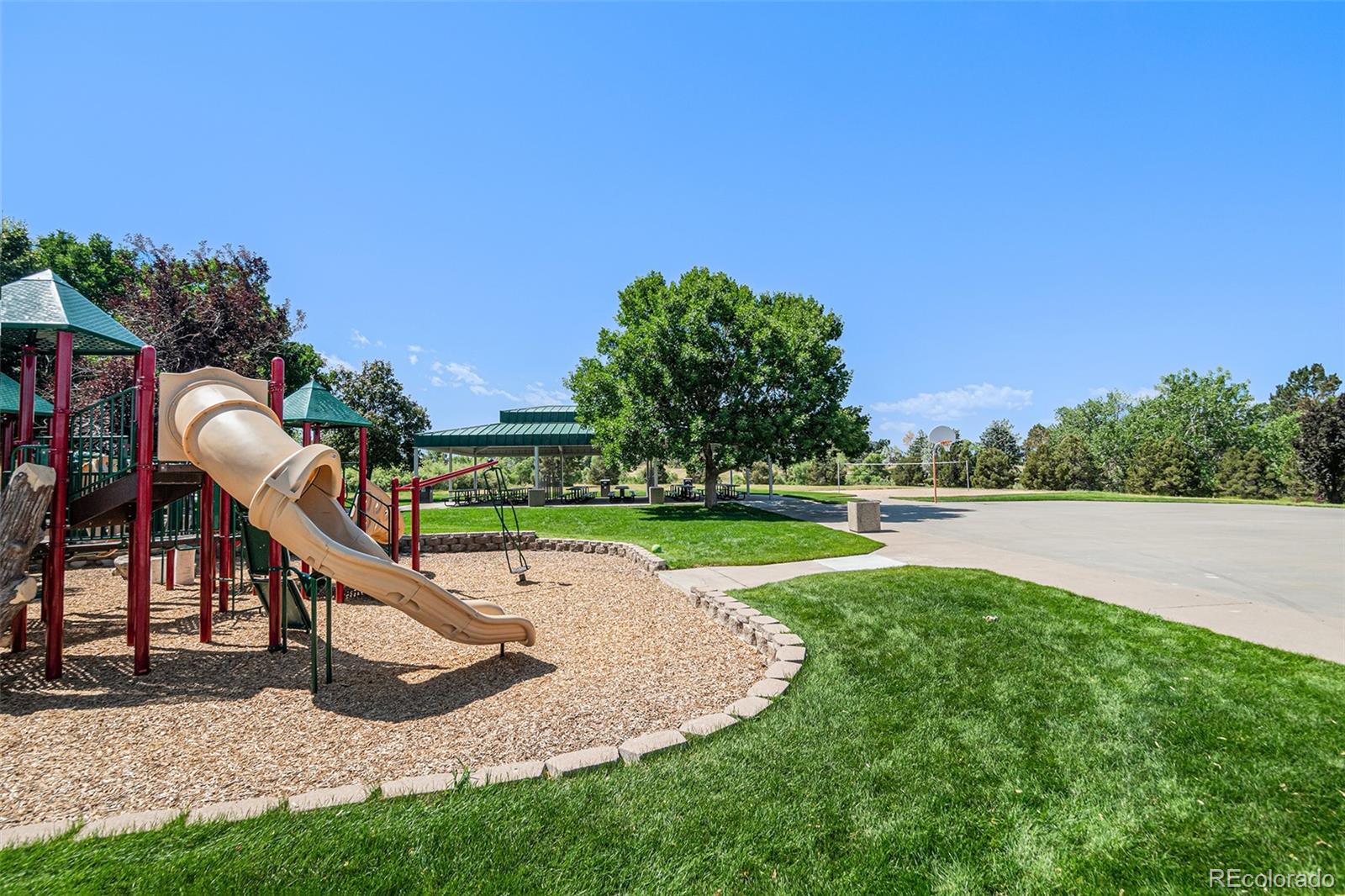 5253 Wangaratta Way Highlands Ranch, CO 80130 - Photo 40 of 43 a view of a park with swings