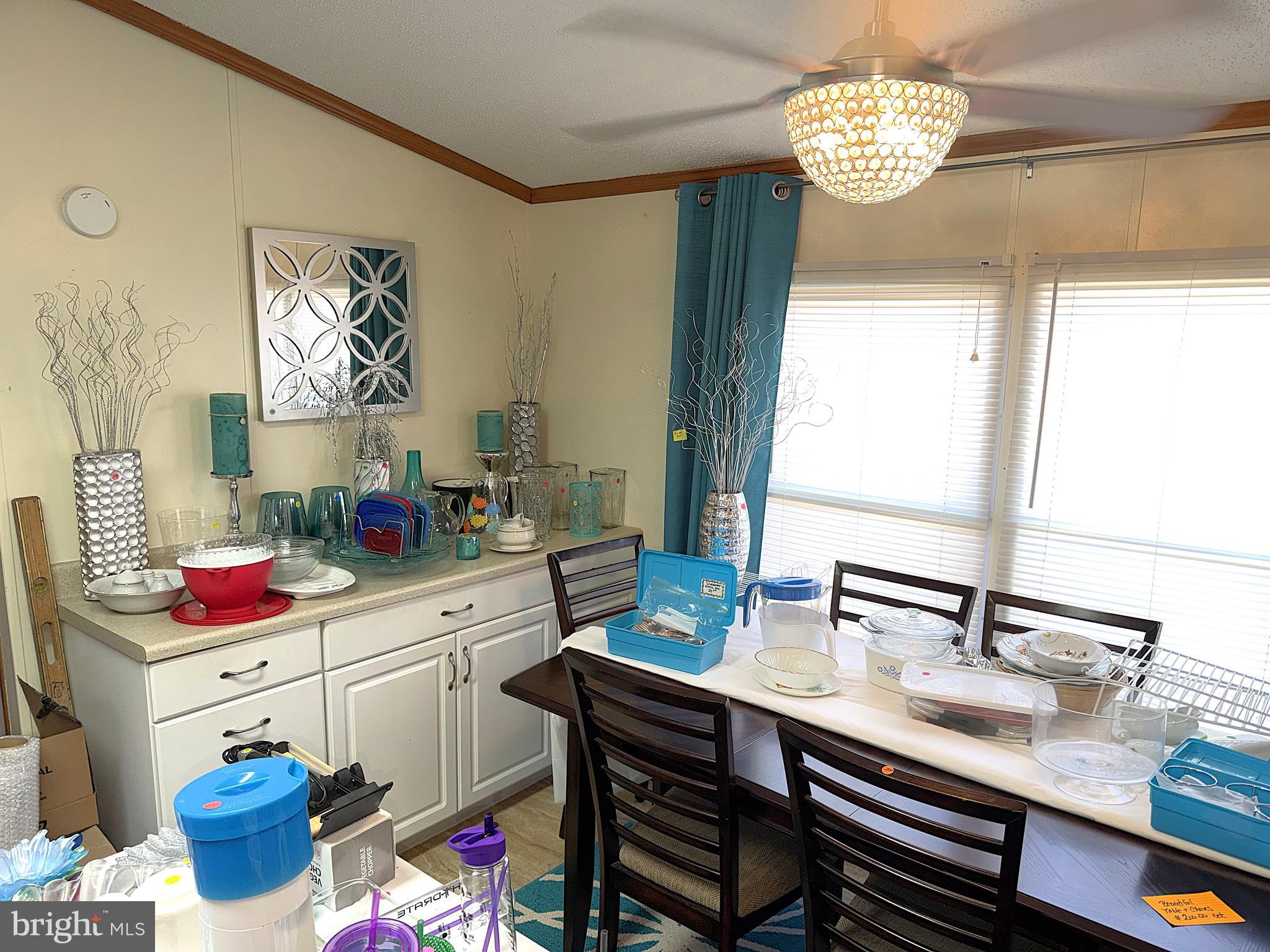 7959 Telegraph Road, Unit 15 Severn, MD 21144 - Photo 7 of 26 a kitchen with a sink cabinets and window