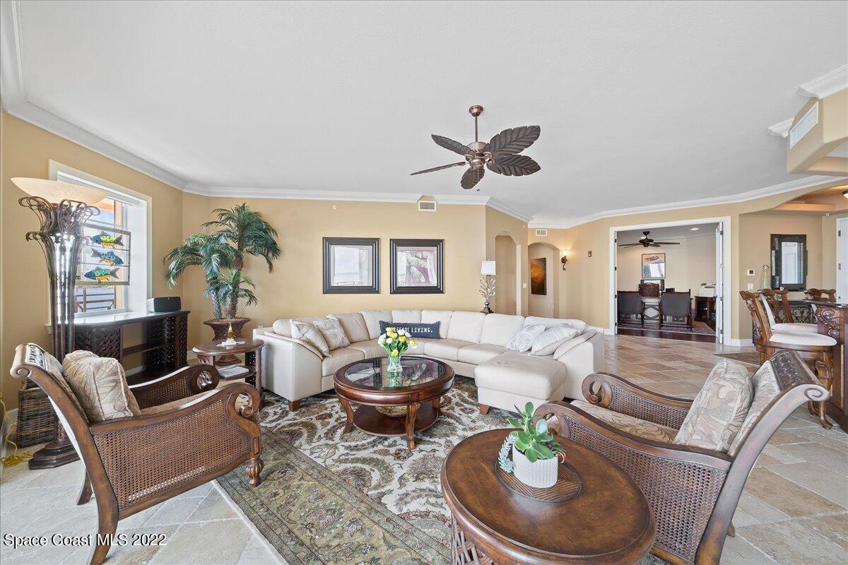 2300 Front Street, Unit 200 Melbourne, FL 32901 - Photo 13 of 92 a living room with furniture potted plant and a large window