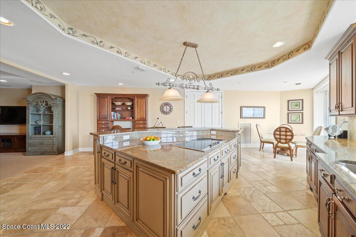 2300 Front Street, Unit 200 Melbourne, FL 32901 - Photo 22 of 92 a kitchen that has a lot of cabinets in it
