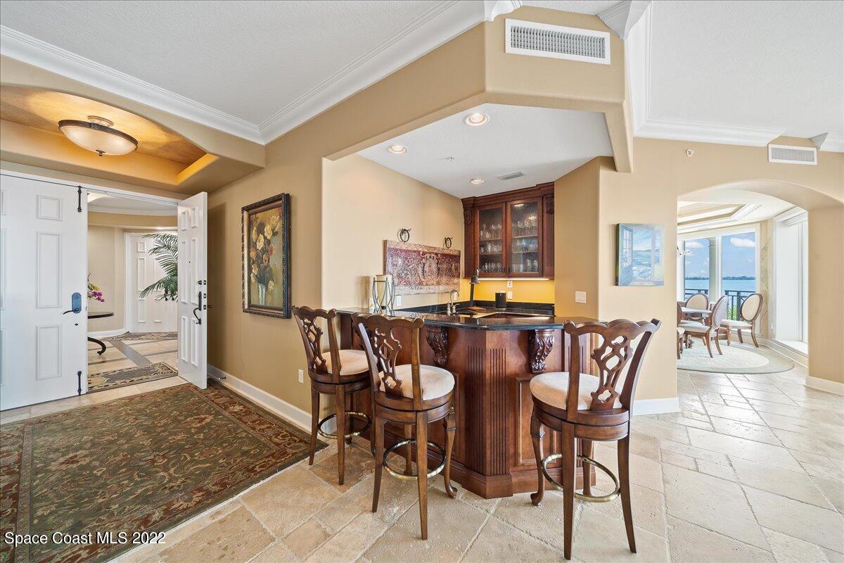 2300 Front Street, Unit 200 Melbourne, FL 32901 - Photo 26 of 92 a view of a dining room with furniture