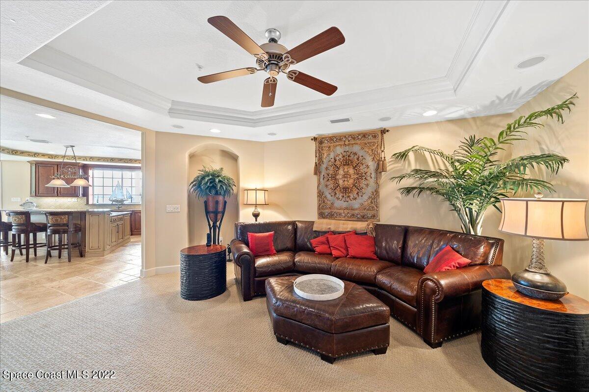 2300 Front Street, Unit 200 Melbourne, FL 32901 - Photo 29 of 92 a living room with furniture and a large window
