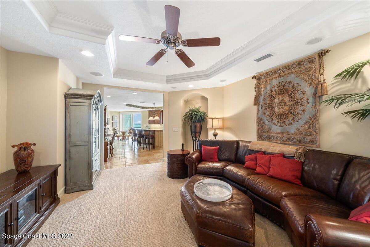 2300 Front Street, Unit 200 Melbourne, FL 32901 - Photo 31 of 92 a living room with furniture and wooden floor