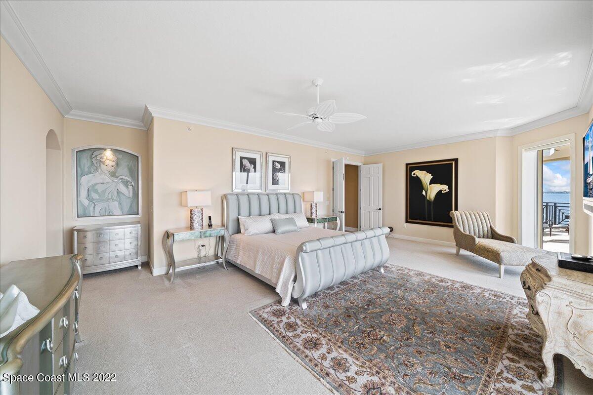 2300 Front Street, Unit 200 Melbourne, FL 32901 - Photo 34 of 92 a bed room with a bed and a couch