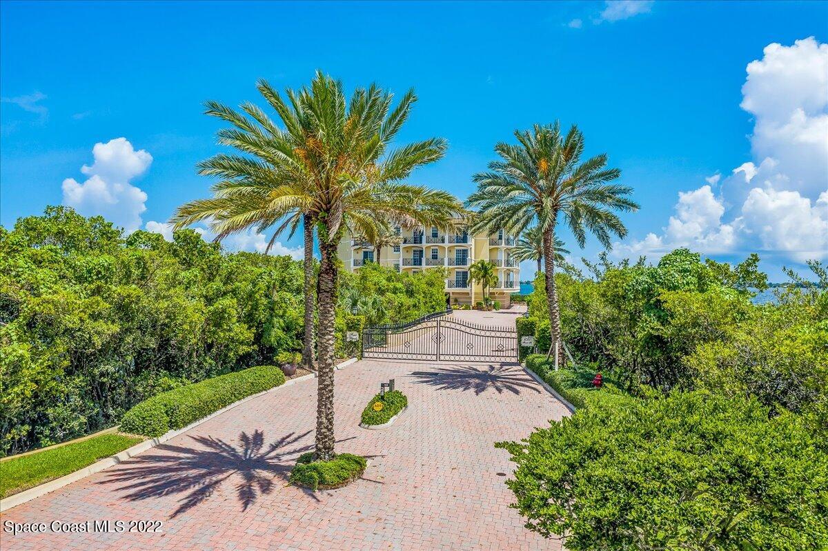 2300 Front Street, Unit 200 Melbourne, FL 32901 - Photo 4 of 92 a view of a backyard with a garden and swimming pool
