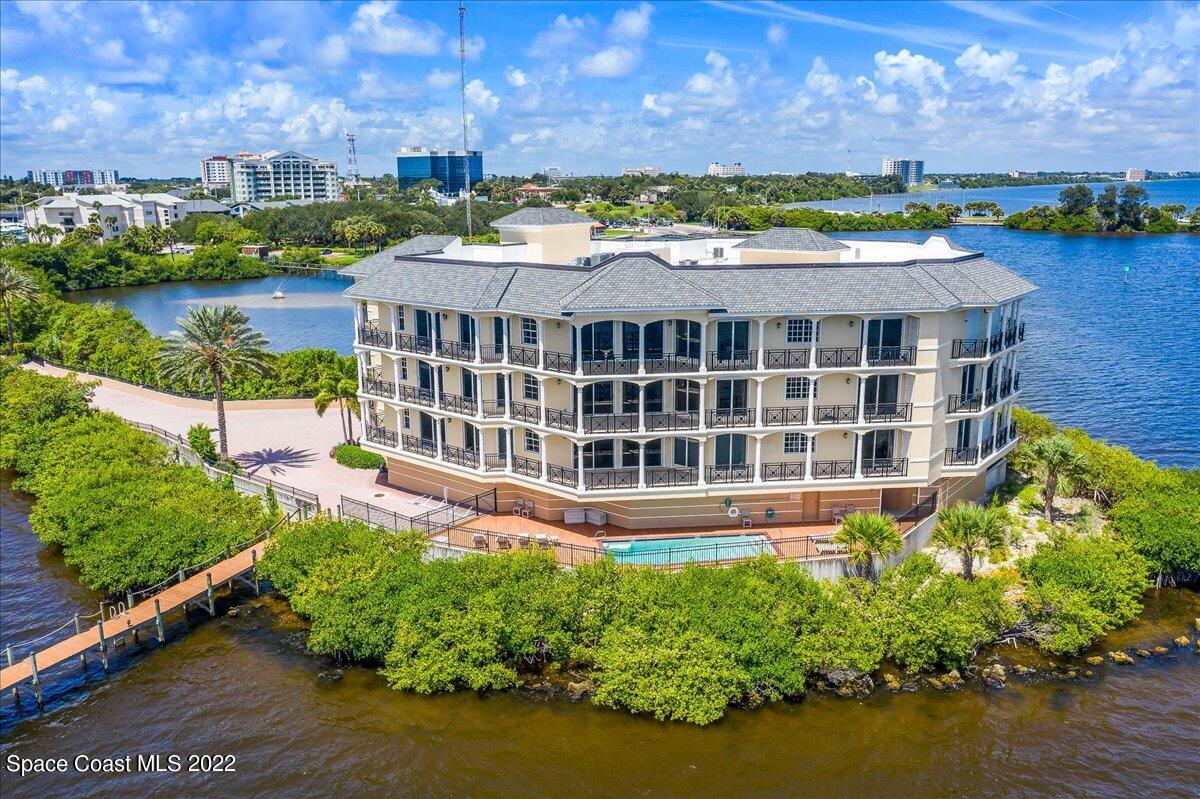 2300 Front Street, Unit 200 Melbourne, FL 32901 - Photo 5 of 92 a view of a house with a garden and lake view