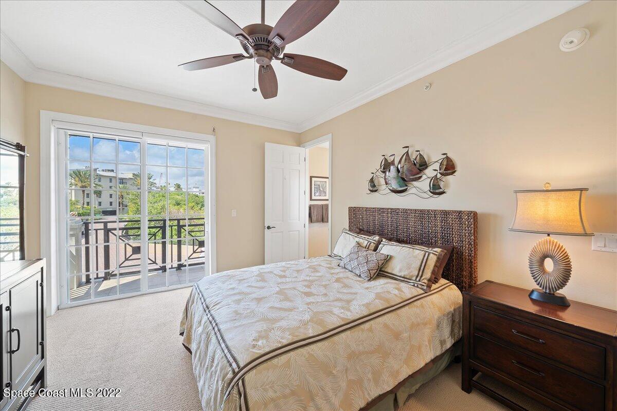 2300 Front Street, Unit 200 Melbourne, FL 32901 - Photo 54 of 92 a bedroom with a large bed and a window