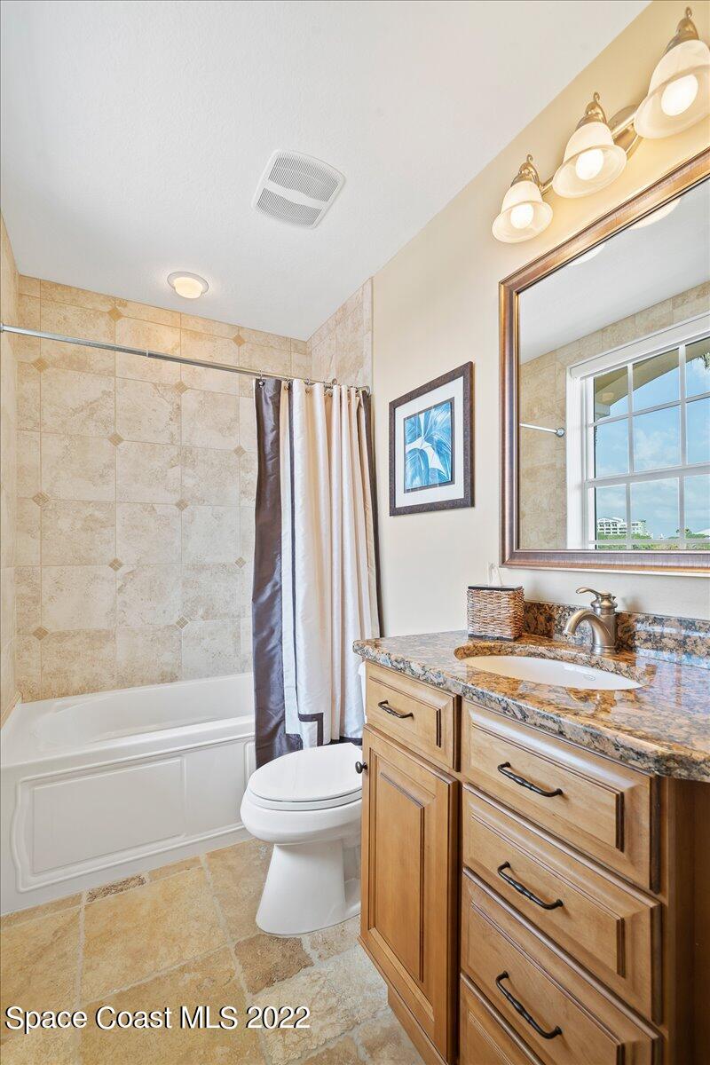 2300 Front Street, Unit 200 Melbourne, FL 32901 - Photo 59 of 92 a bathroom with a sink a toilet and a bathtub