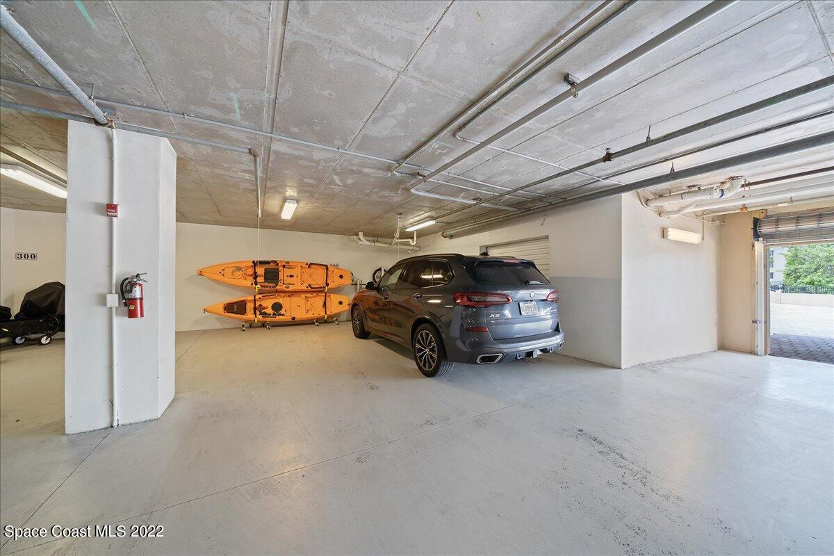 2300 Front Street, Unit 200 Melbourne, FL 32901 - Photo 78 of 92 a car parked in a parking garage