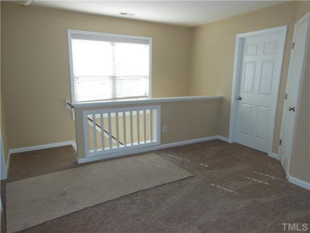 8516 Tierra Del Sol Way Raleigh, NC 27616 - Photo 11 of 20 Brand new carpet on the entire second floor. Loft area is big enough for a play area or for a desk to turn in to a office.