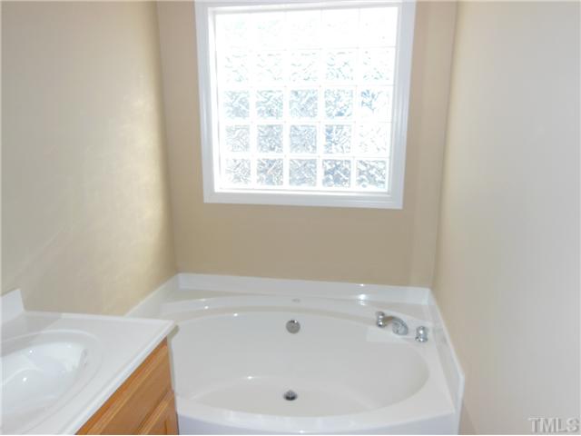 8516 Tierra Del Sol Way Raleigh, NC 27616 - Photo 15 of 20 Garden tub with lots of natural light form the window!
