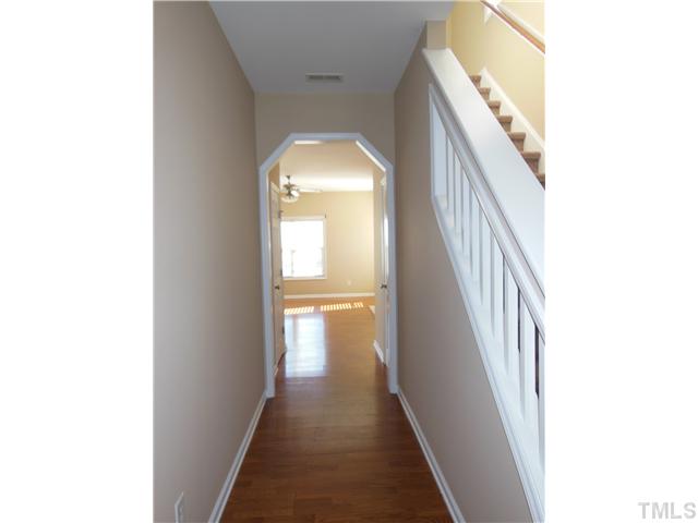 8516 Tierra Del Sol Way Raleigh, NC 27616 - Photo 3 of 20 Nice entry foyer hallway. Coat closet on your left and a spacious half bath to your right. Just to the right of the front door you can see the staircase.