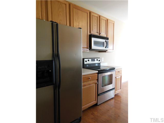 8516 Tierra Del Sol Way Raleigh, NC 27616 - Photo 8 of 20 Stainless appliances and nice shiny floors with tons of cabinet space!