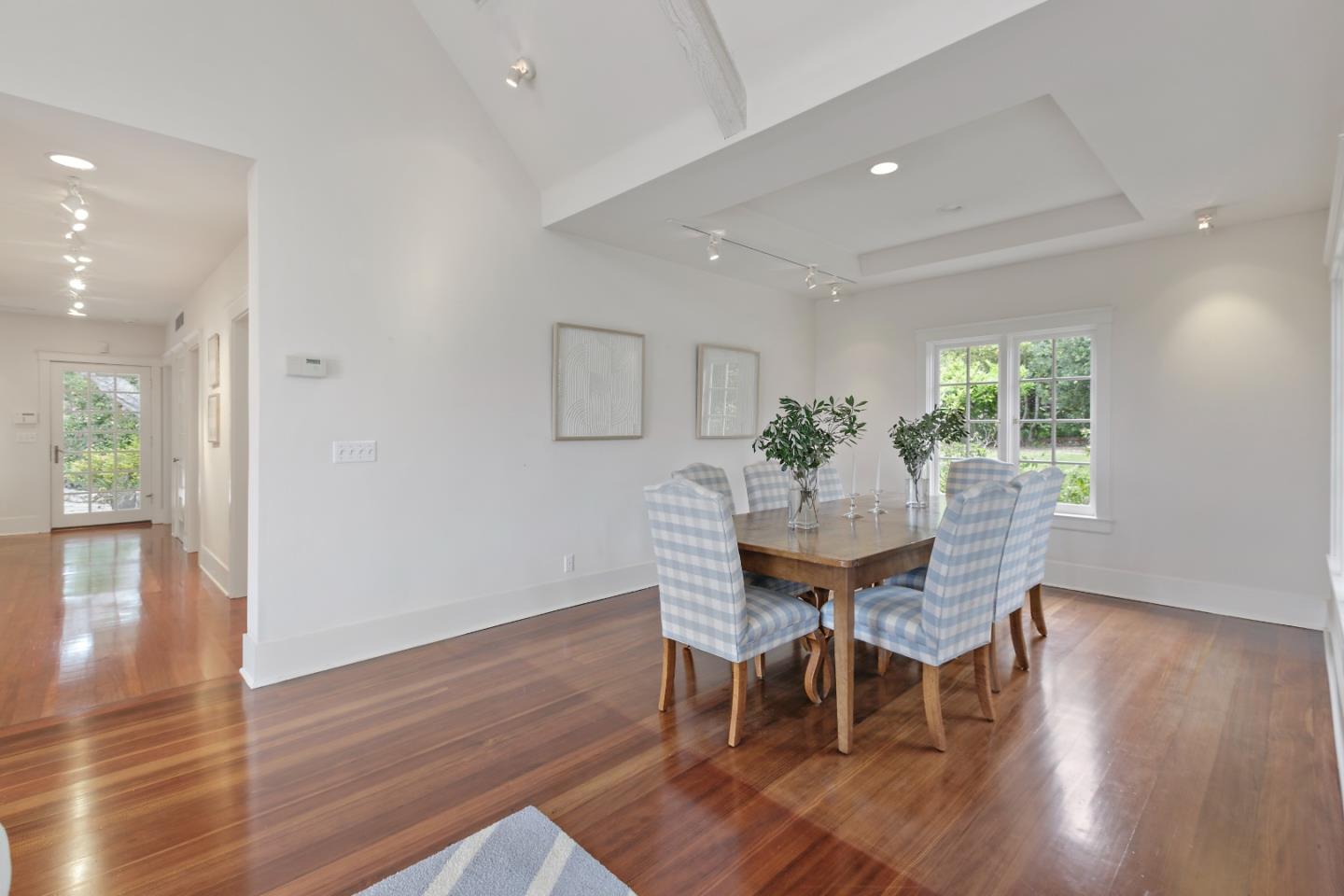 3929 Ronda Road Pebble Beach, CA 93953 - Photo 20 of 88 a view of a dining room with furniture and wooden floor