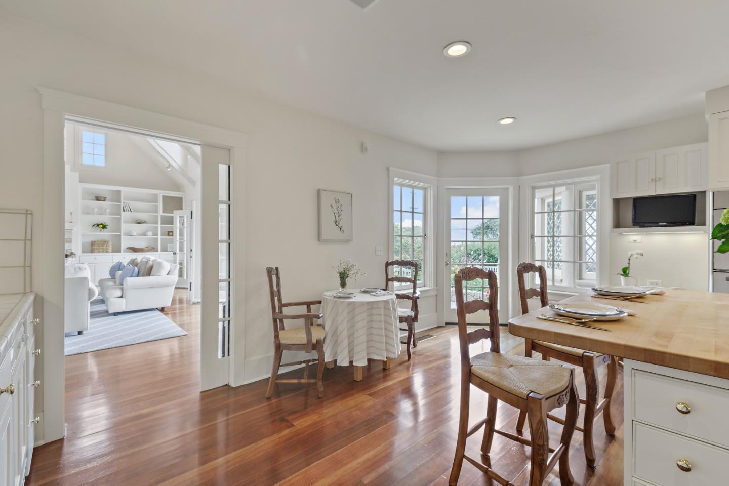 3929 Ronda Road Pebble Beach, CA 93953 - Photo 27 of 88 a view of a dining room with furniture and wooden floor