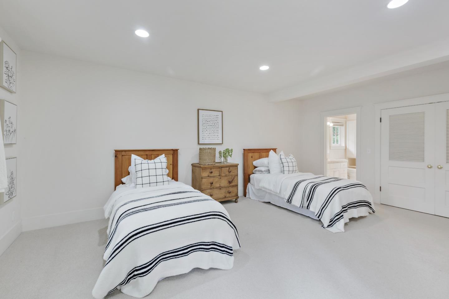 3929 Ronda Road Pebble Beach, CA 93953 - Photo 29 of 88 a bedroom with two beds and painting on the wall