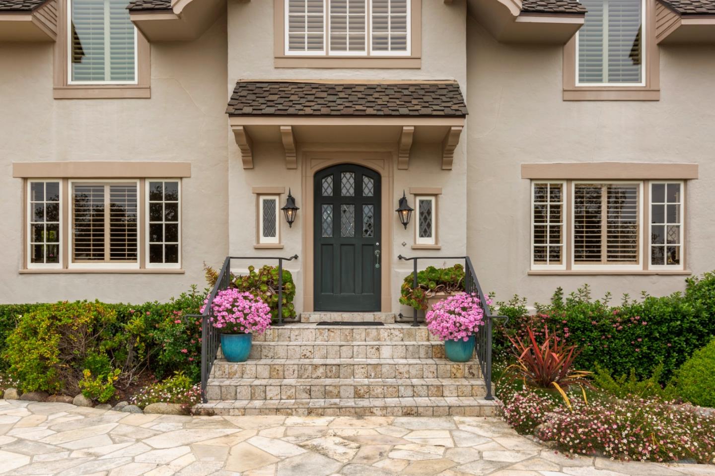 3929 Ronda Road Pebble Beach, CA 93953 - Photo 4 of 88 a front view of a house with an outdoor space