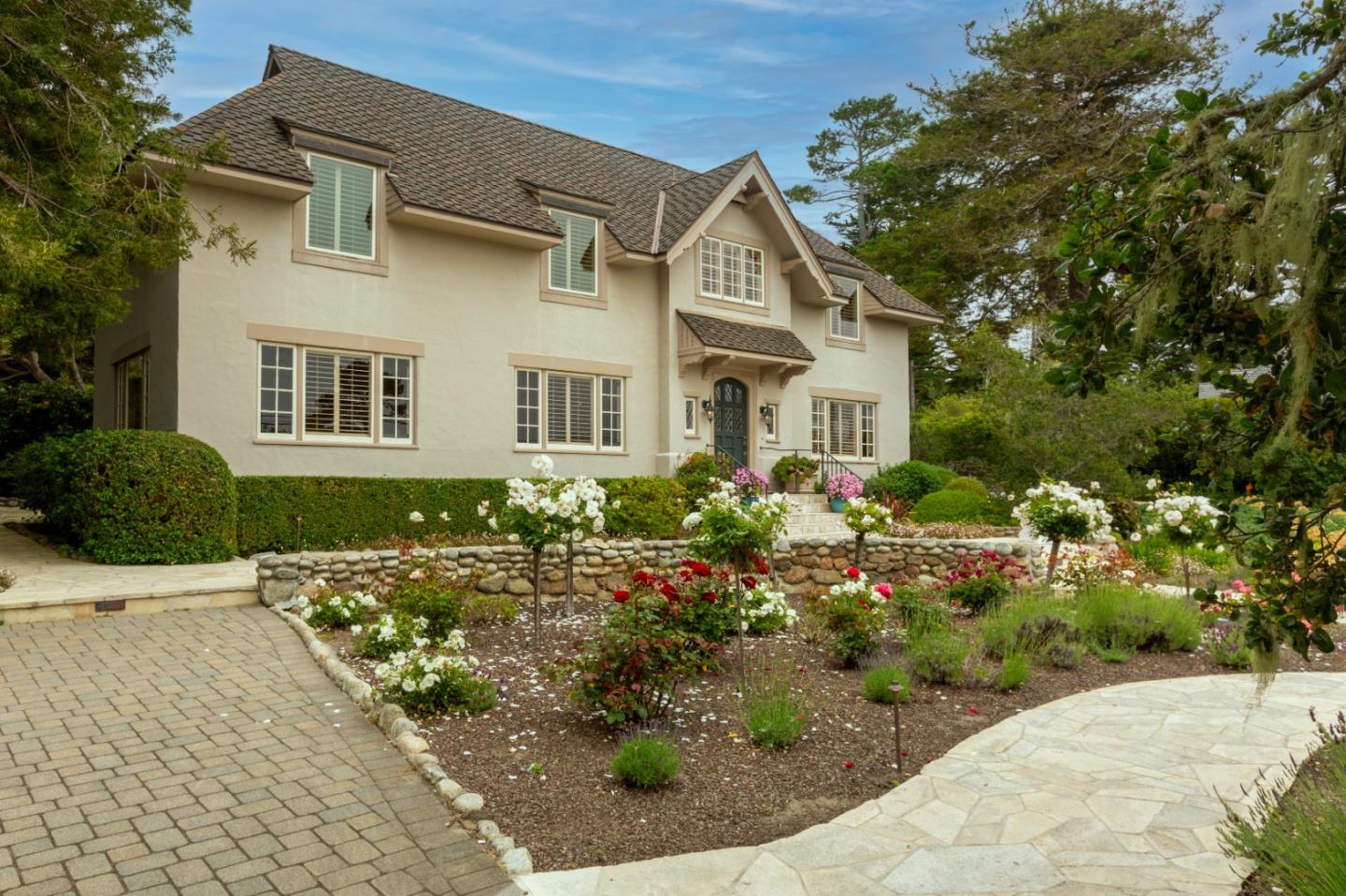 3929 Ronda Road Pebble Beach, CA 93953 - Photo 70 of 88 a front view of a house with a yard