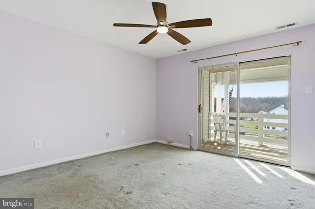 en empty room with windows