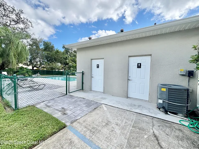 a view of a house with a garden