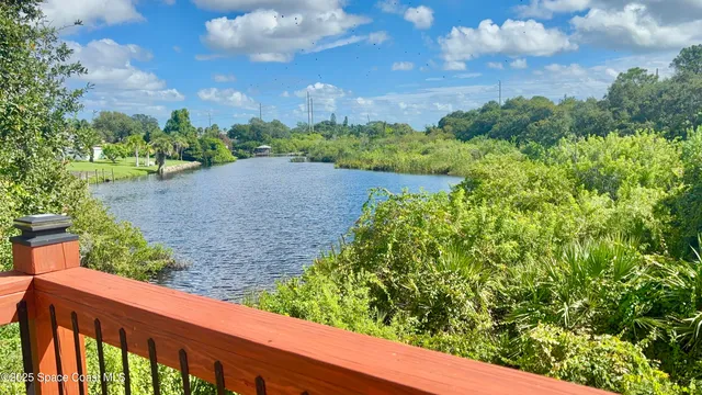 a view of a garden from a balcony