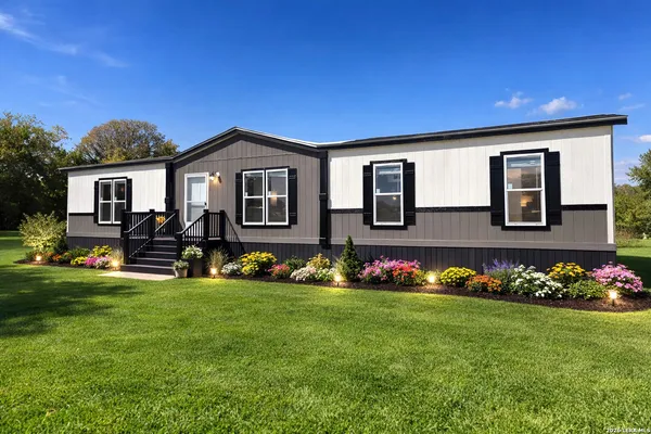 a front view of house with yard