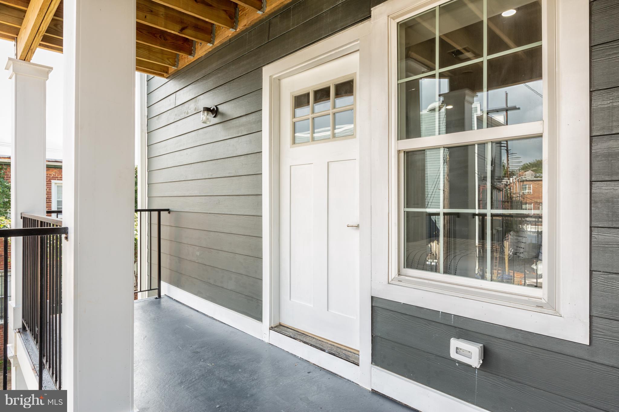 718 Jackson Street Northeast, Unit 1 Washington, DC 20017 - Photo 18 of 26 a view of front door