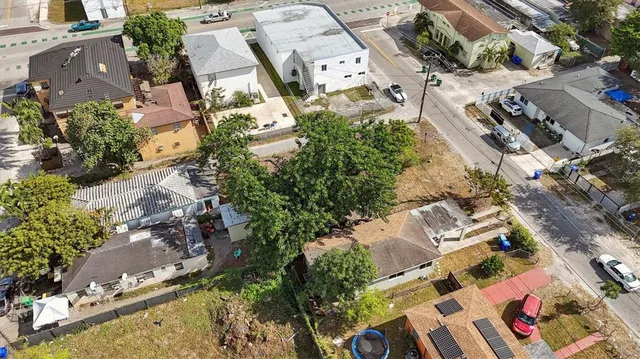 an aerial view of residential house with outdoor space
