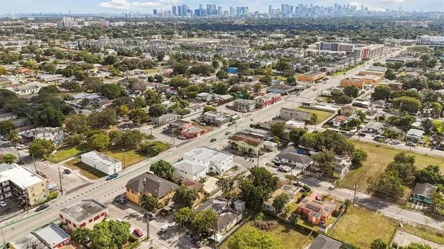 an aerial view of residential building with parking space