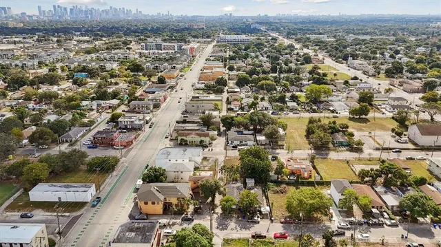 an aerial view of residential building and parking space