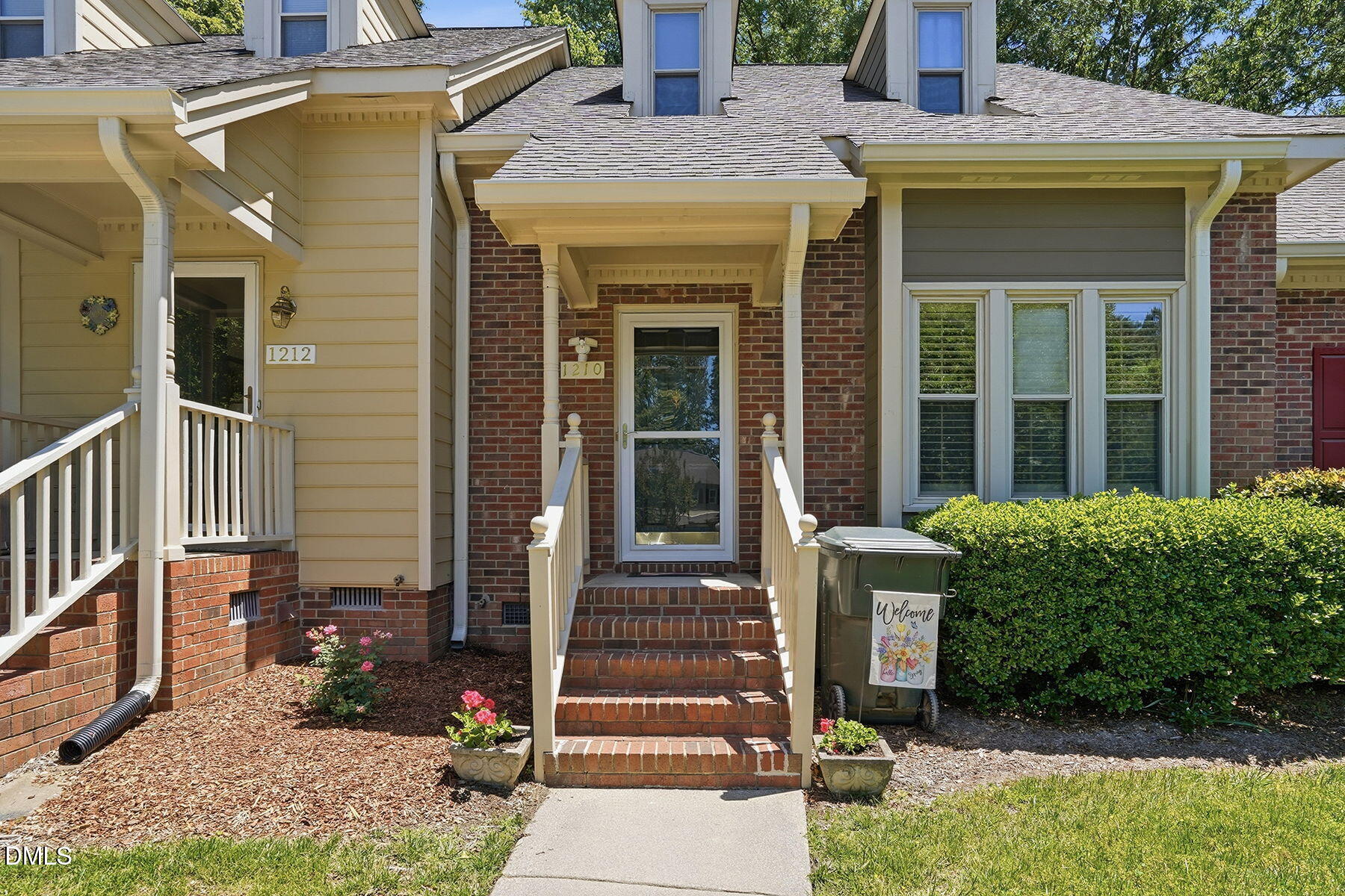 1210 Shadow Bark Court Raleigh, NC 27603 - Photo 4 of 29 a front view of a house with garden