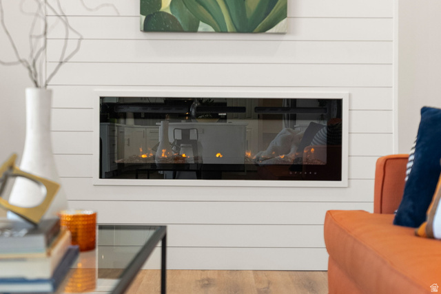 368 Spring Creek Road Providence, UT 84332 - Photo 8 of 45 Detailed view of a glass covered fireplace and wood finished floors