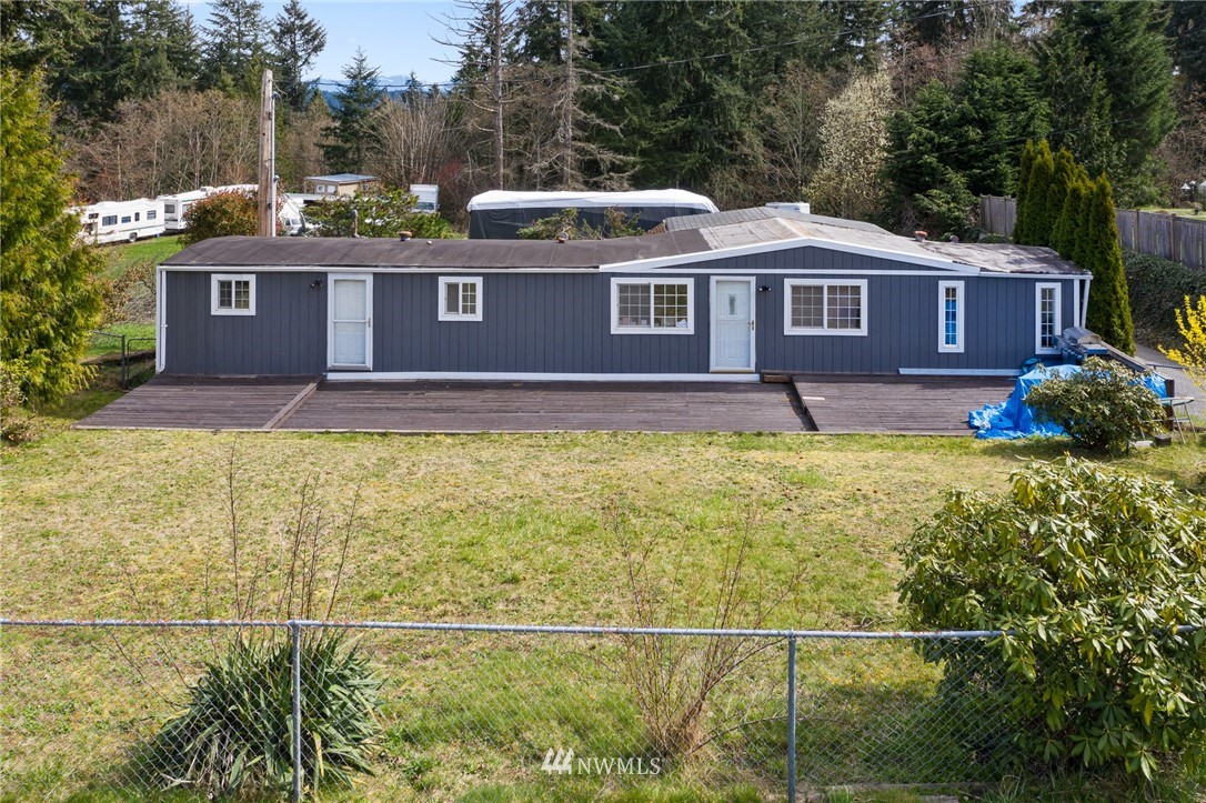 21325 Meridian Drive Southeast Bothell, WA 98021 - Photo 18 of 22 a view of a house with a yard