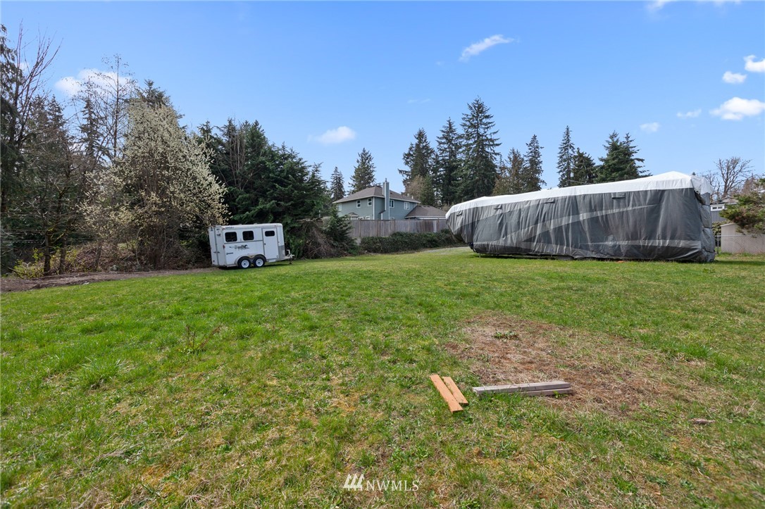 21325 Meridian Drive Southeast Bothell, WA 98021 - Photo 20 of 22 a view of a house with a yard and sitting area