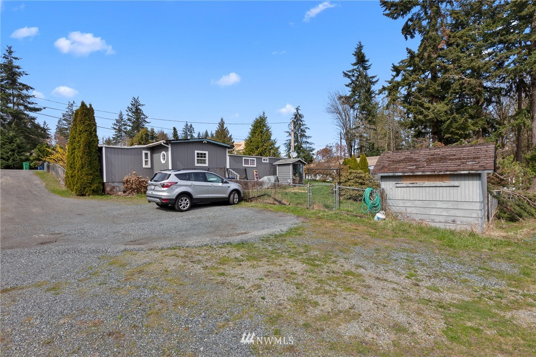 21325 Meridian Drive Southeast Bothell, WA 98021 - Photo 22 of 22 a car parked in front of a house