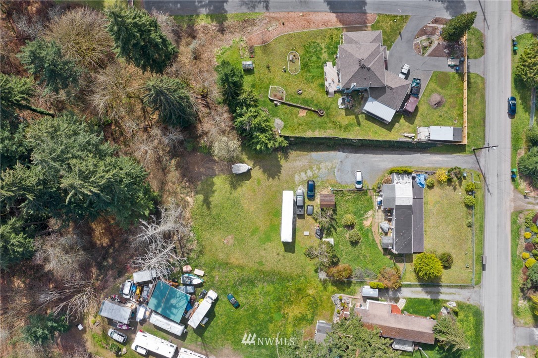 21325 Meridian Drive Southeast Bothell, WA 98021 - Photo 5 of 22 an aerial view of waterside residential houses with outdoor space