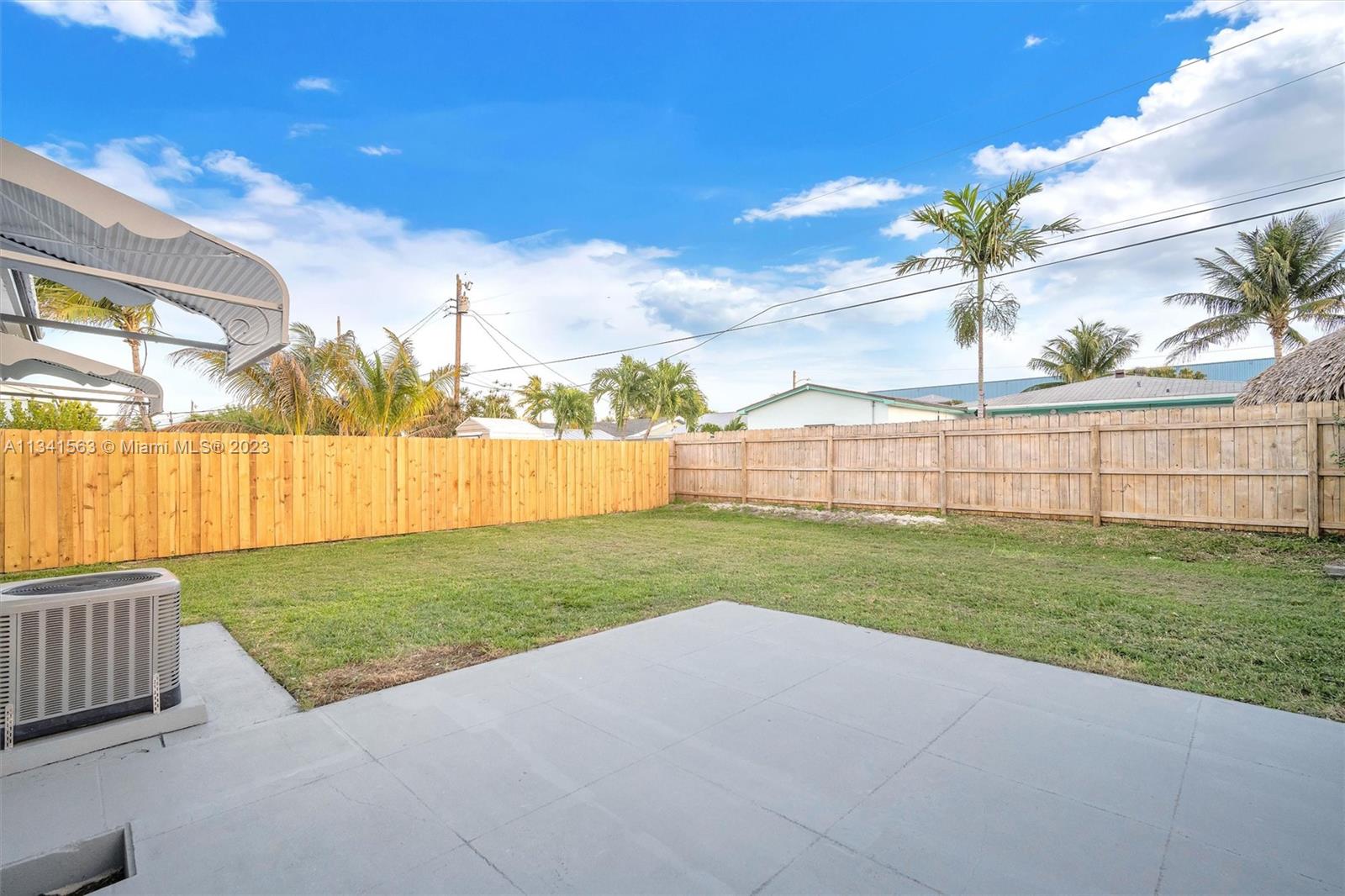 217 East 24th Street Riviera Beach, FL 33404 - Photo 16 of 27 a view of a garden with a slide